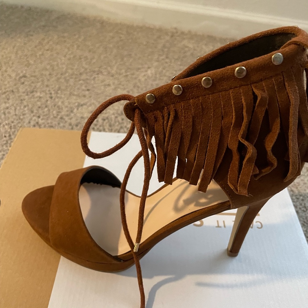 Brand new heels never wore .